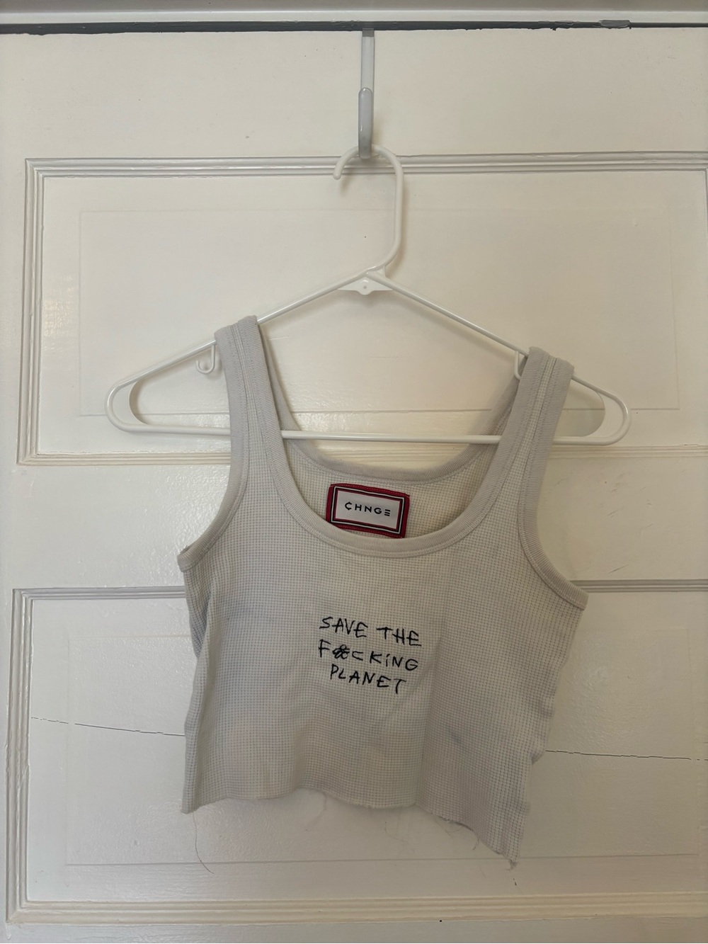 CHNGE Cream Ribbed Crop Tank with Black Slogan
